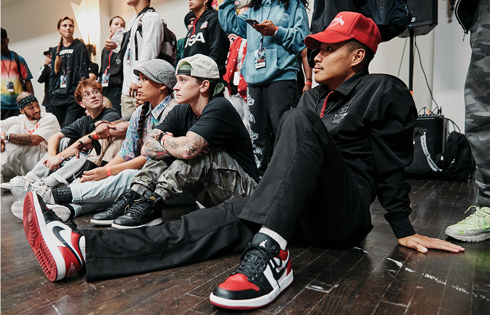 a group of people sitting on the floor